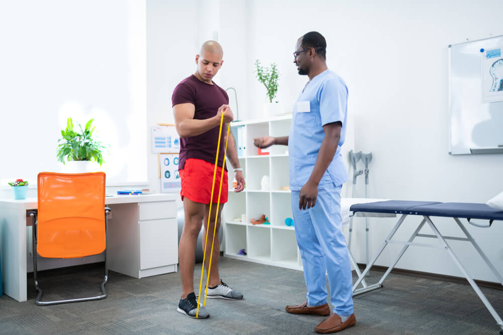 Recovering from a sports injury with physical therapy