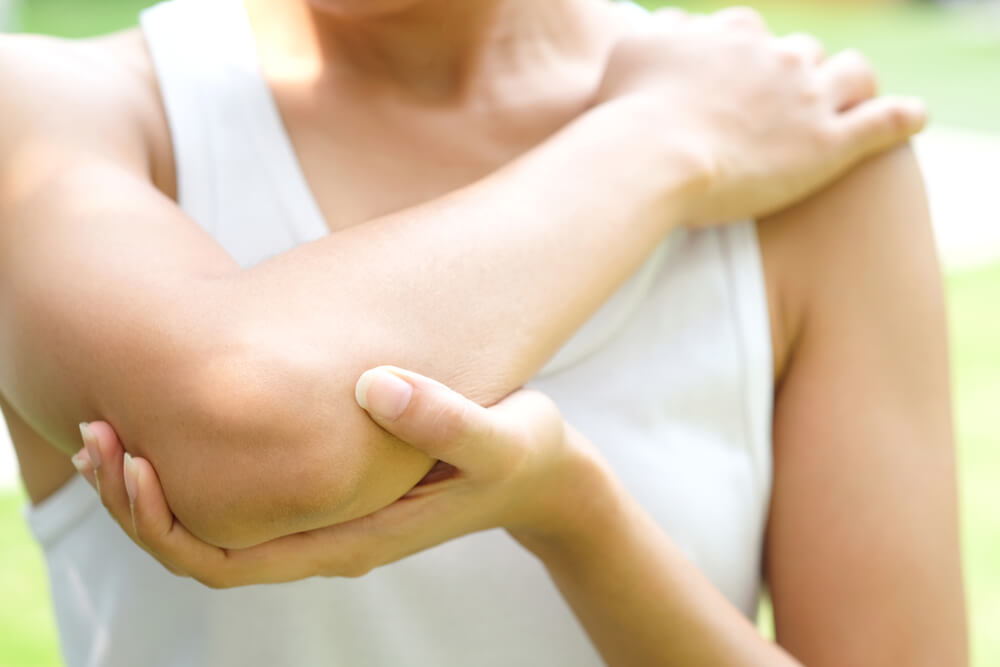 Tennis elbow symptoms and treatment in Warrenton, MO shutterstock 1066761980 Tennis elbow symptoms and treatment in Warrenton, MO