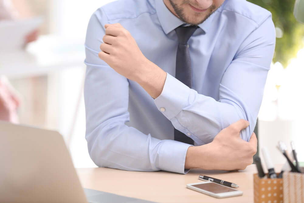 Three tennis elbow from typing treatments in Ellisville, MO