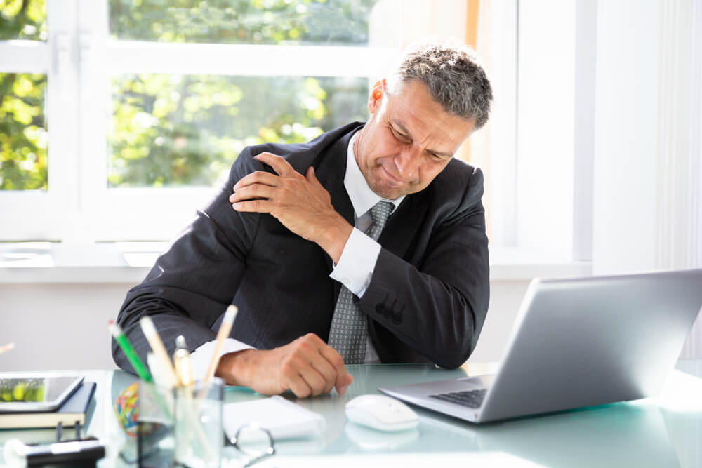 What types of exercises can improve shoulder mobility? shutterstock 1158954076 pinched nerve in shoulder symptoms
