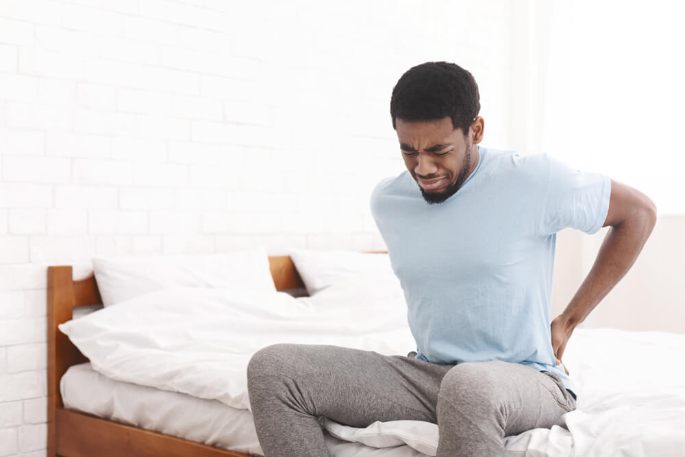 Three conditions that could be causing pain at the base of your spine