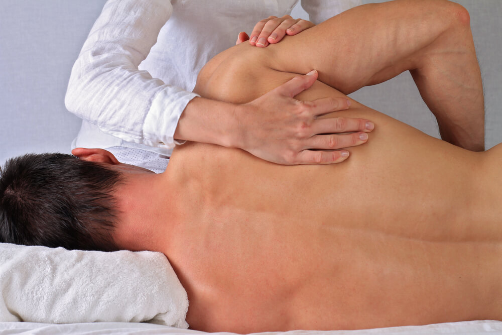 What treatments do physical therapists use for breaking up scar tissue? shutterstock 423193645 physical therapy breaking up scar tissue