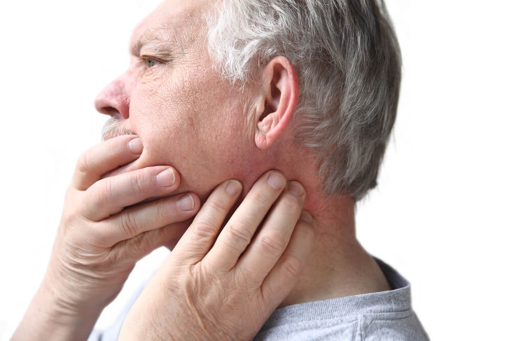What causes neck and jaw pain at the same time?