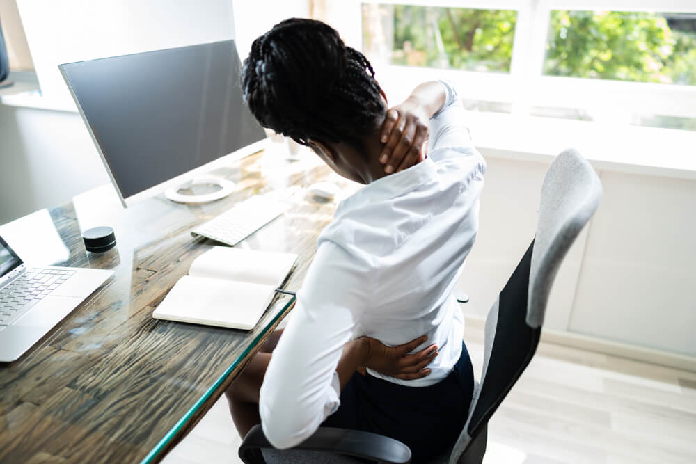 Three posture corrections that can reduce your pain when sitting shutterstock 1772914766 pain when sitting