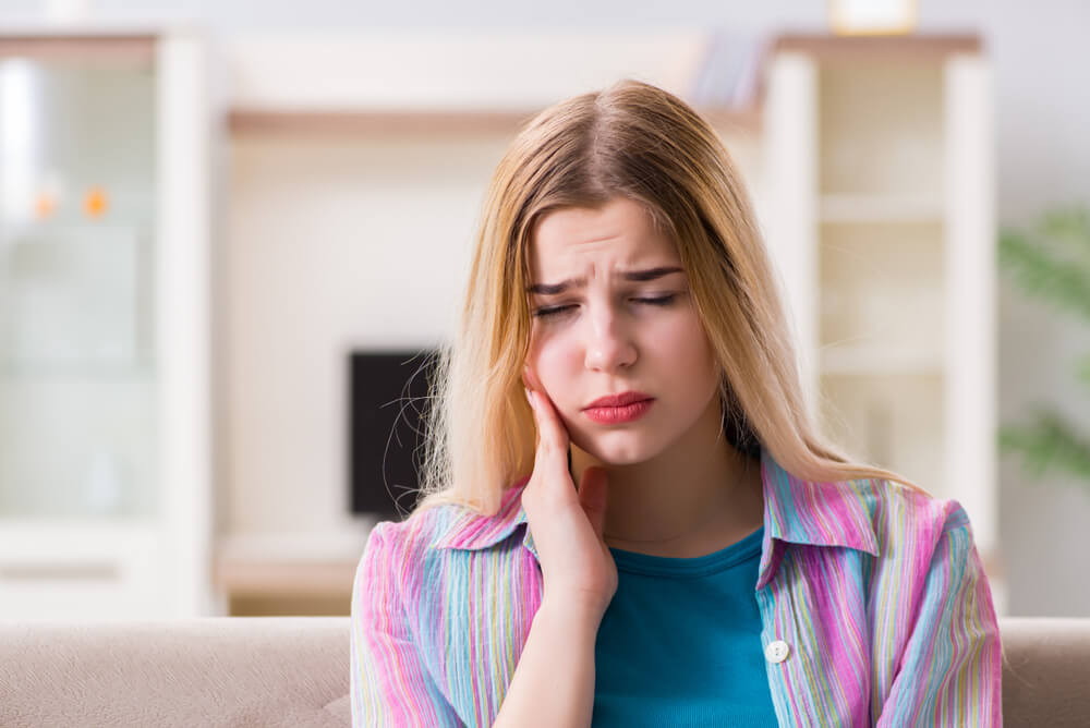 What does TMJ dysfunction feel like?