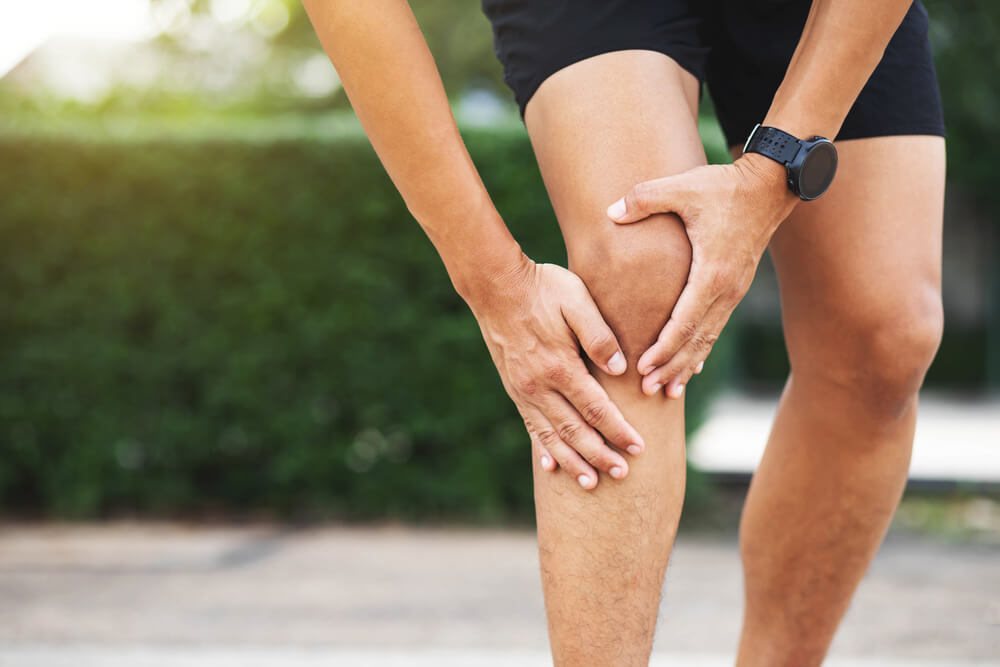 What causes the crunching sound in your knee and is physical therapy the answer? shutterstock 1933543019 crunching sound in knee