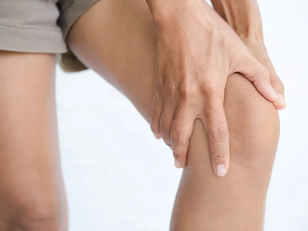 Jumper's knee physical therapy: What to expect woman knee pain legs 2022 11 09 04 49 44 utc 1 woman-knee-pain-legs